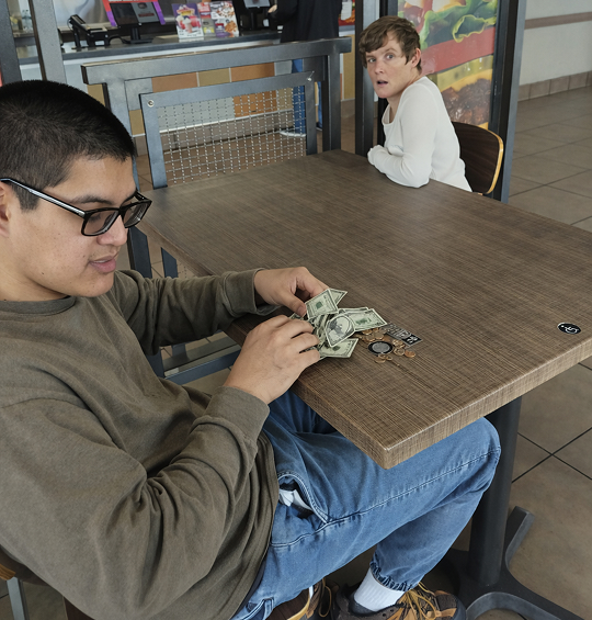 Counting dollars at Jack in the Box